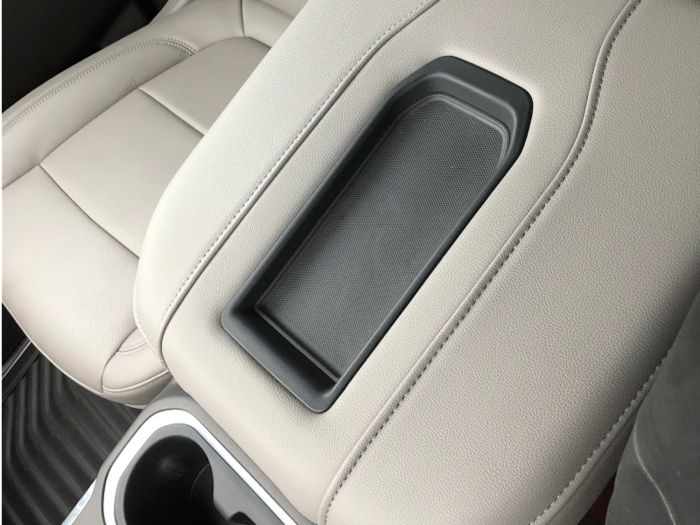 Storage is ample. There is a smartphone pad on the center armrest ...