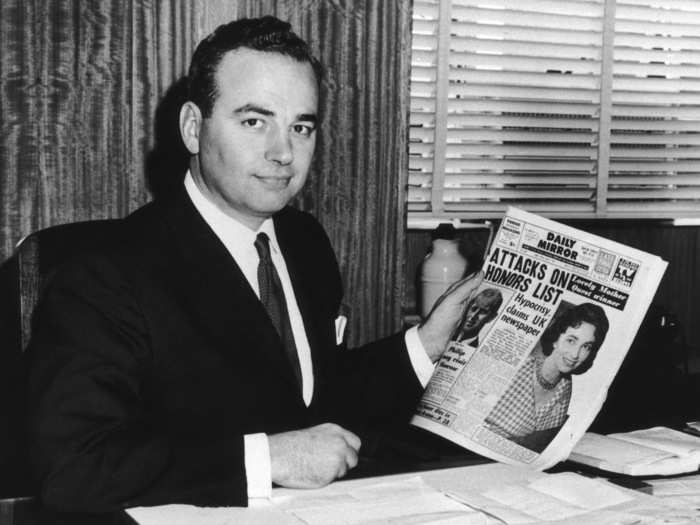 Murdoch, seen here in 1960, inherited a chain of Australian newspapers from his father. According to Bloomberg, Murdoch embedded himself in all matters of production, from writing copy to managing the printer and redesigning page layouts.