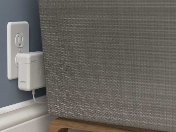 This is a huge space saver: Now you can attach your MacBook charger to the wall behind your couch, for instance.