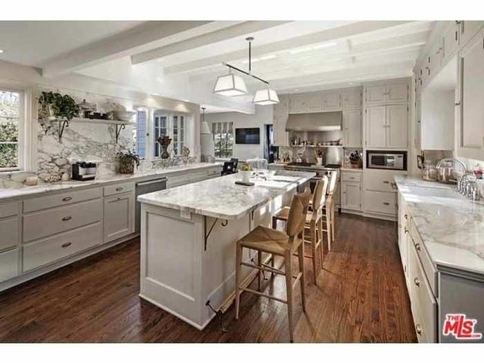 ... and a kitchen with marble accents.