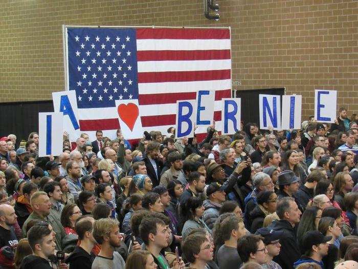 As Sanders spoke in Des Moines, a dedicated crew of sign-wavers made their affinity for the senator quite clear.