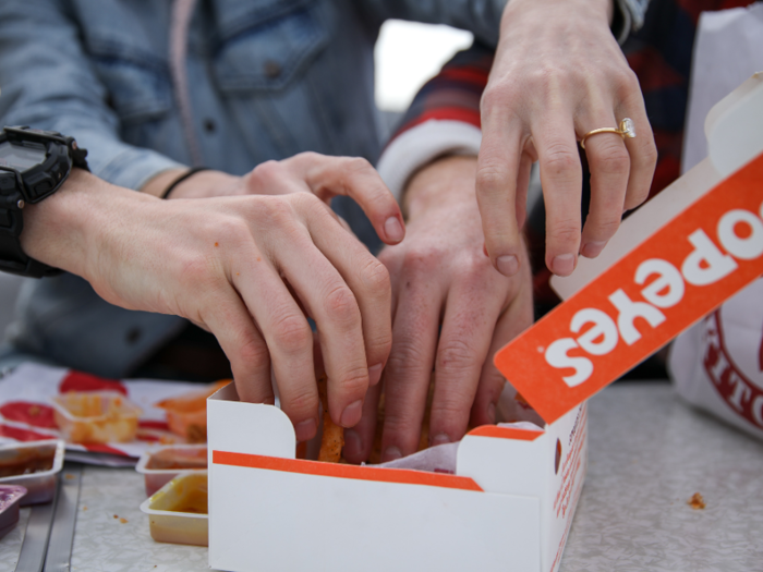 Popeyes, on the other hand, delivered all of its food in a wide box, allowing for all of our hands to pull from its contents at once.