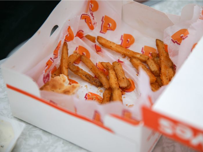 Each fry comes dressed in an even layer of Cajun spice.