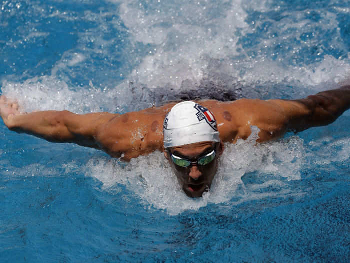 Michael Phelps climbs into an altitude chamber.