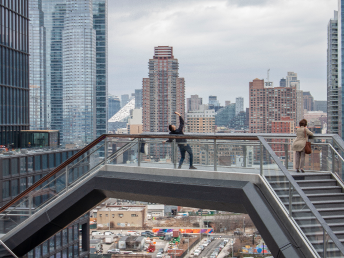 Some people were literally bending over backward to get the perfect selfie in the Vessel.