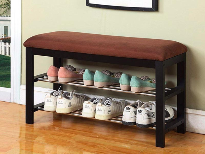 A combination shoe rack and hallway bench