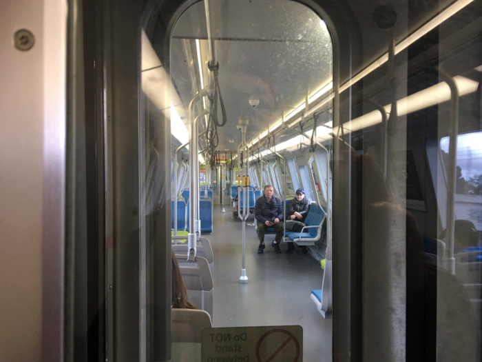 The new cars feel wide open. They include center poles to make it easier for standing passengers of all heights to hang on.