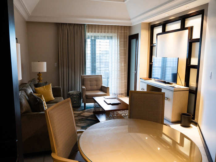 The suite had two large sitting areas, essentially dividing the non-bedroom into living and dining areas.