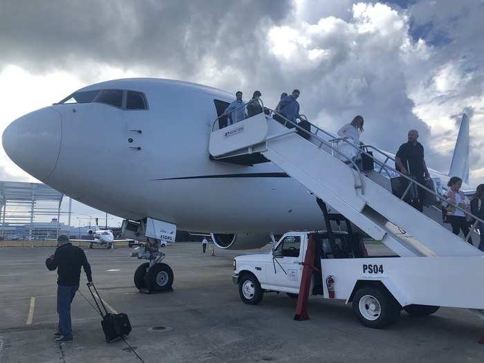 After a quick and comfortable flight, we landed at Luis Muñoz Marín International Airport in San Juan, and taxied to the private and charter area. We walked down from the plane ...