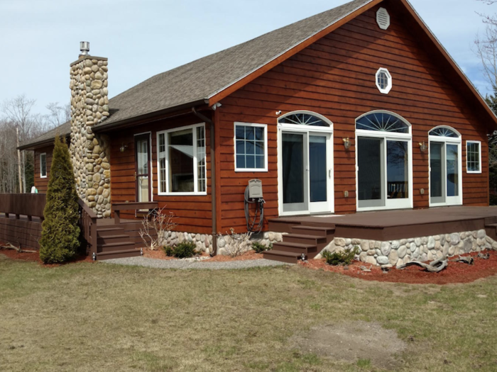 A $289,900 Lake Superior house features 150 feet of waterfront on Whitefish Bay.