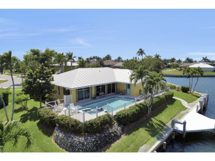 Perched on Marco Island in southwest Florida, this colorful $800,000 home comes with the state