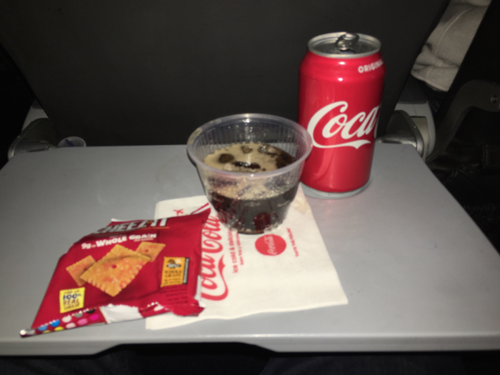  For the most part, in-flight dining in economy class means a soda and a snack. 