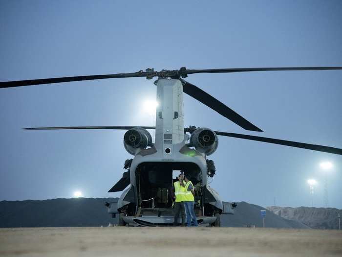 The Chinook has a maximum capacity to carry 11 tonnes and 45 troops. Additionally it has underslung capacity to load 10 tonnes.