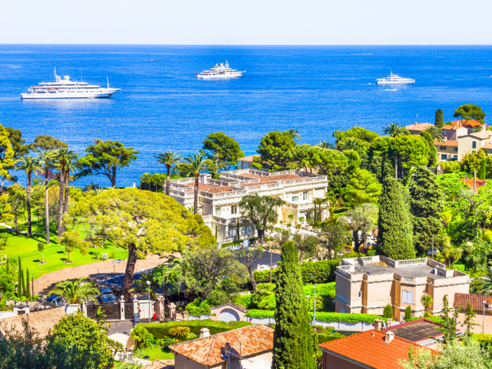 Saint-Jean-Cap-Ferrat is known for its striking coastal views, stately villas, ultra-luxurious hotels, and yacht-filled harbor.