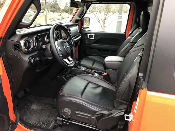 The black interior featured leather-trimmed and topstitched seats.