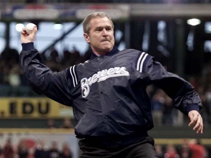 George W. Bush threw the first pitch at the Milwaukee Brewers vs. Cincinnati Reds game in 2001, the first year of his presidency.