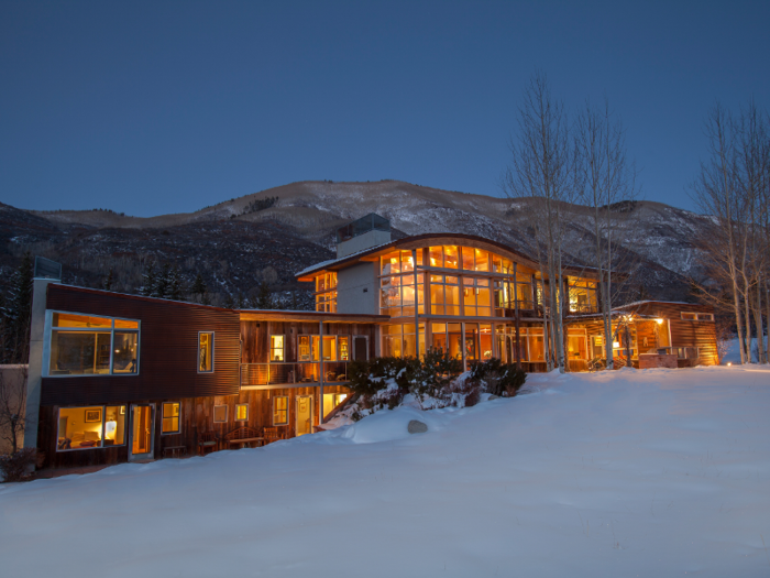 The glass-front home, built in 2002, was designed by architect Harry Teague. The home spreads across a total of 6,802 square feet.