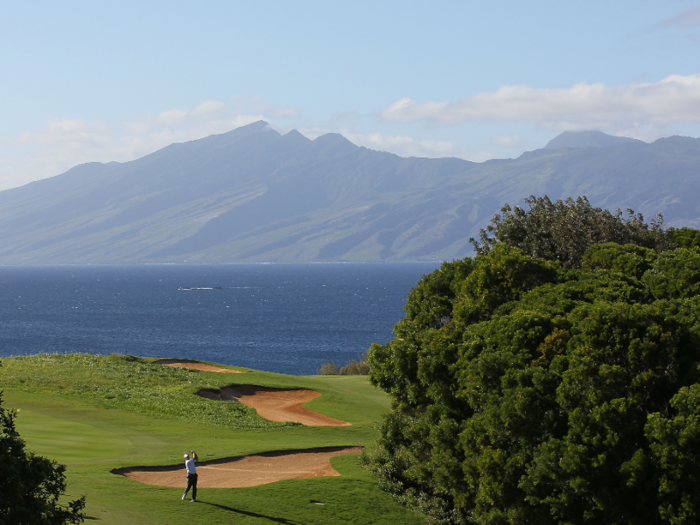 The billionaire is reportedly an avid golf player. He spends three weeks every summer playing in Hawaii, where he owns two golf courses that he bought for a combined $74.1 million.