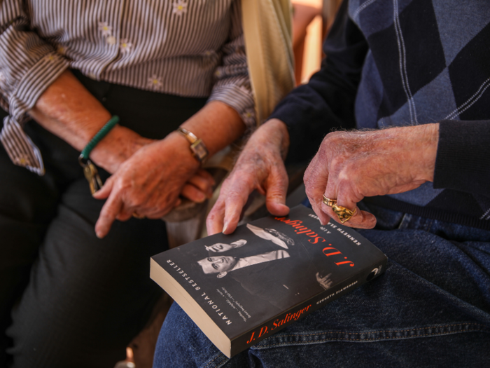 They were carrying a biography of the writer J.D. Salinger when we met them. Evelyn Adler said she wanted to suggest "The Catcher In the Rye" to the members of the book club she