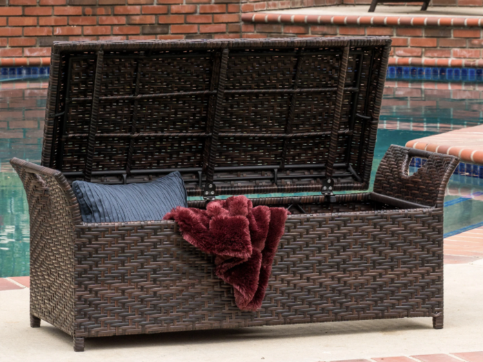 A storage bench for patio accessories