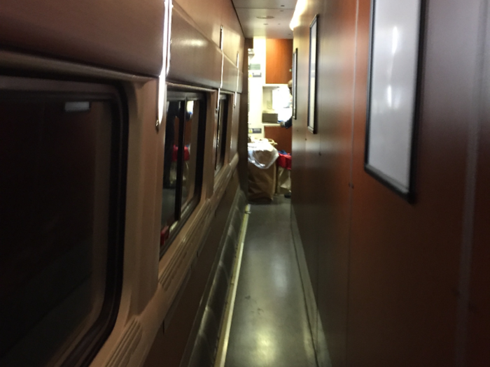 I slipped through the narrow corridor leading to the dining car. At this point, I was about 15 minutes late to dinner.