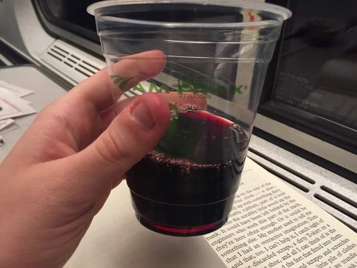 As I read the locomotive-themed thriller, I sipped on a plastic cup of cabernet from the snack bar.