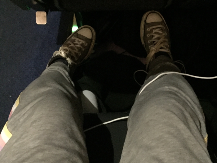 When I got to my seat, I was surprised by how much legroom I had. There was even a metal footrest that I could pull out.