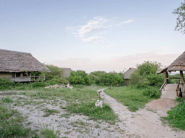 Each hut is made up of a thatched roof with a wooden deck and framing. They look very rustic. Some of the huts are larger to accommodate families.