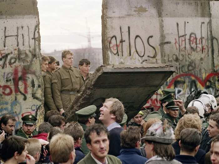 1989: After nearly 28 years, the Berlin Wall began to come down as Cold War tensions thawed across Europe and Communist leaders in East Berlin allowed for relations with the West to loosen. It would be more than a year before the wall was fully demolished and democracy could take hold.