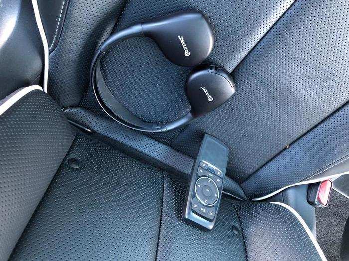 ... as well as wireless headphones and a remote. Passengers can access their own entertainment while the driver can continue to listen to music.