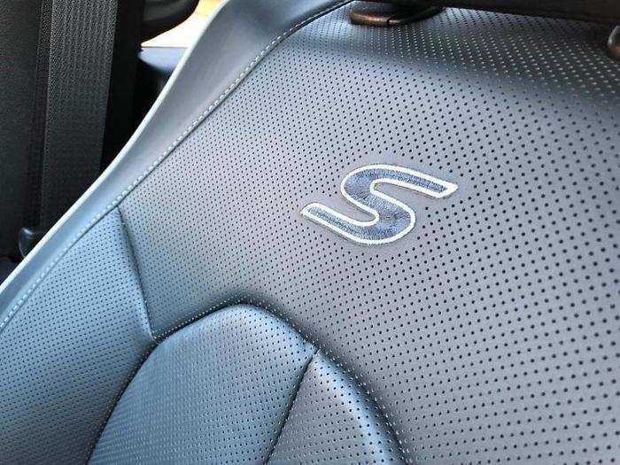 The bucket seats with "S" logos are crafted from Nappa leather.