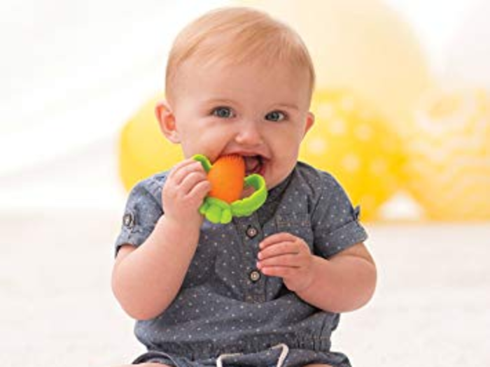 A soft silicone teether shaped like a carrot to get them loving their veggies