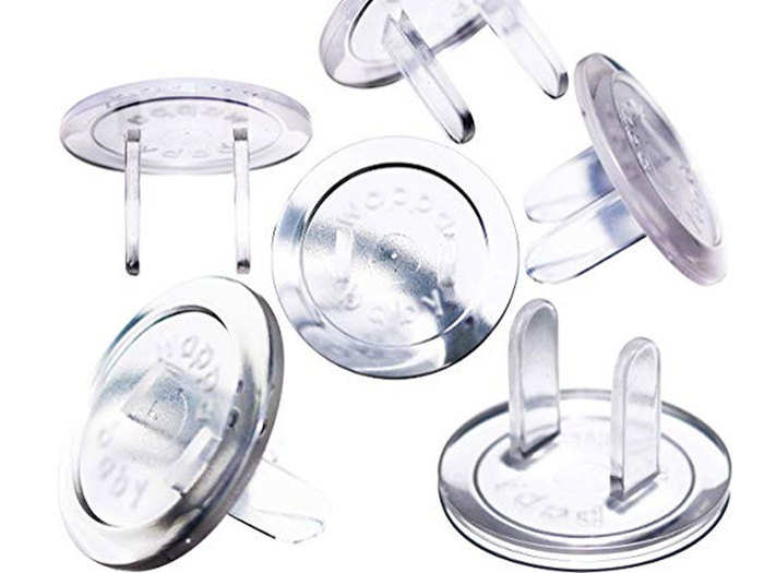 A set of clear baby-proofing outlet covers that blend right in