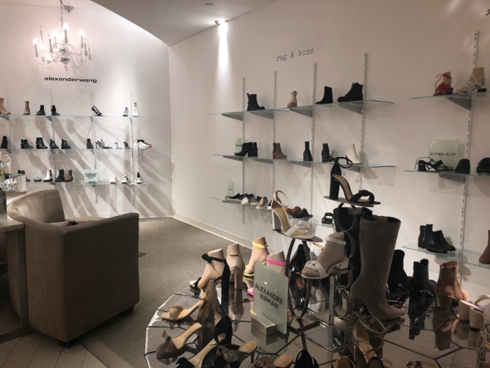 While much of the store was going through renovations, this floor felt particularly cramped by walled-off work zones. It was also strange to see Alexander Wang and 3.1 Phillip Lim sitting on makeshift shelves like these ...