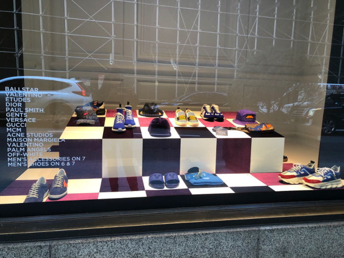 ... while five shoe-focused displays celebrating styles like sneakers, slides, heels, and boots faced 49th Street. Because Neiman Marcus is located in a shopping complex, there are no window displays — Saks takes the cake in this category.