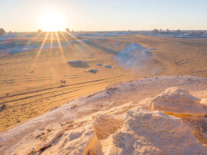 I sat on one of the large dome-like rock formations known as "inselbergs" and watched the sun rise. The desert was freezing right up until the moment the sunlight hit me.