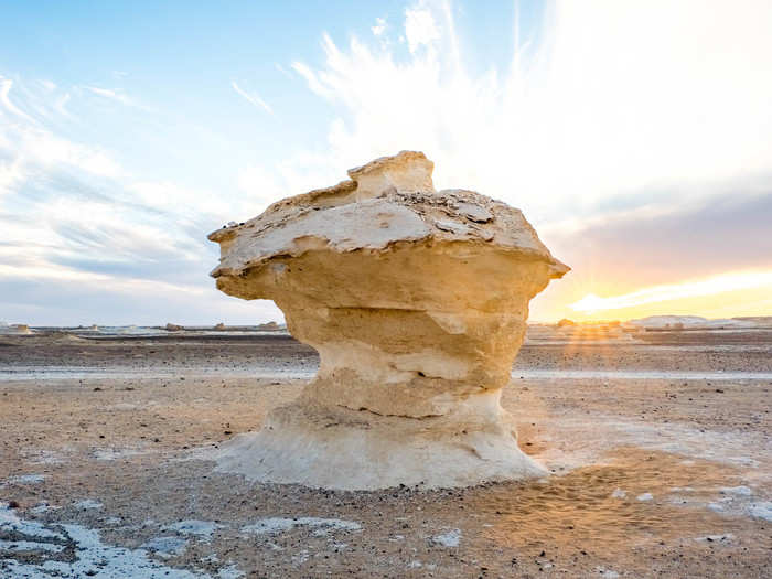 The sandstorms erode calcium rock into natural sculptures. Some look like mushrooms, ice cream cones, or atomic bombs.