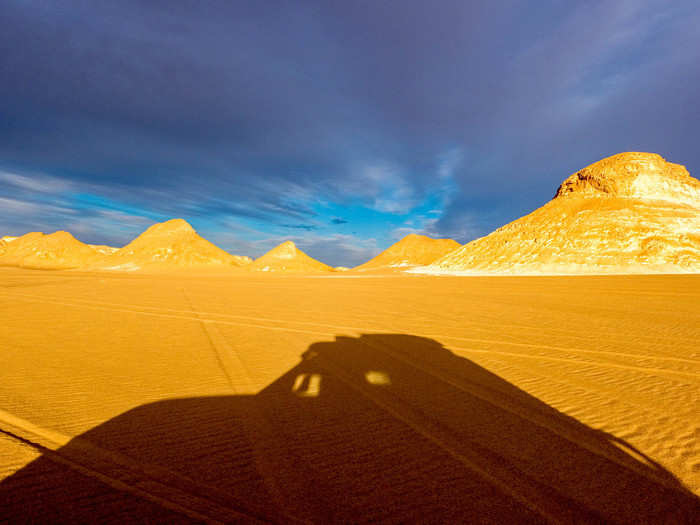 Our guide was racing down the sand dune at full speed, gliding over the top.