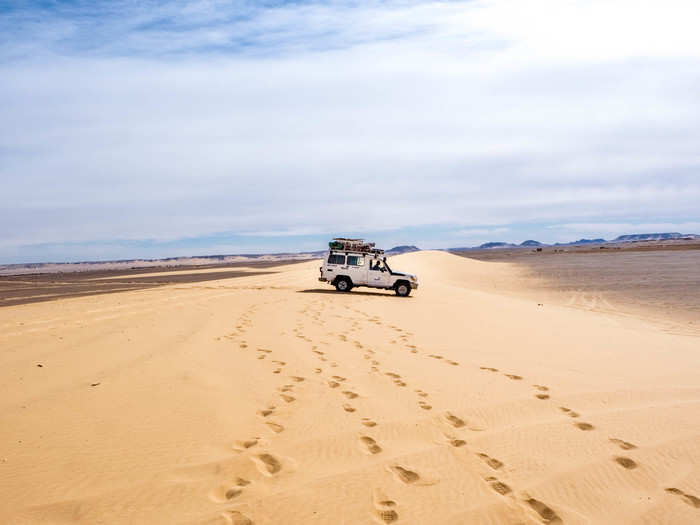 The next morning, we had a few stops to make before going to the grand finale: the White Desert. First, we stopped at Ghurd al-Ghurabi, a large sand dune known as the "Raven Sand Dune."