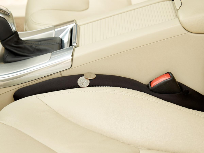 Drop-stop automotive car seat gap filler