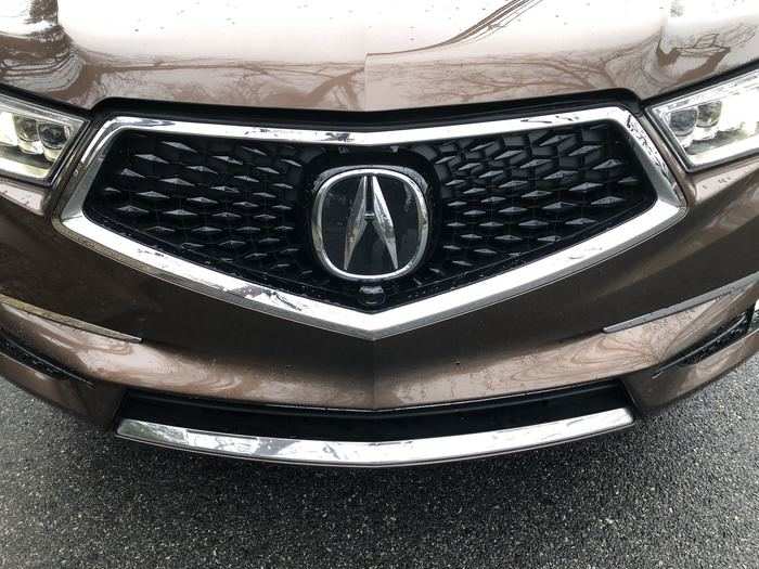 The Acura badge does double duty — it