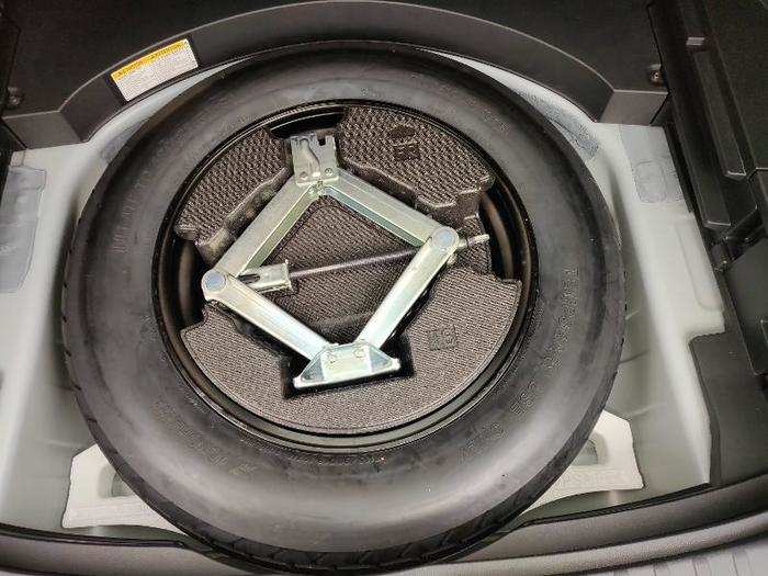 13. Spare tire: Under the cargo floor is a spare tire, an increasingly rare feature in cars these days.
