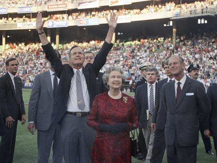 George H.W. Bush, a life-long baseball fan, took Queen Elizabeth and Prince Phillip to a Baltimore Orioles vs. Oakland Athletics game in 1991 — the first time the queen had been to a baseball game.