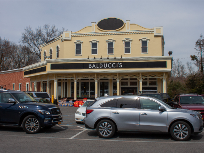 The residence is across the street from the Golden Horseshoe Shopping Center and Balducci