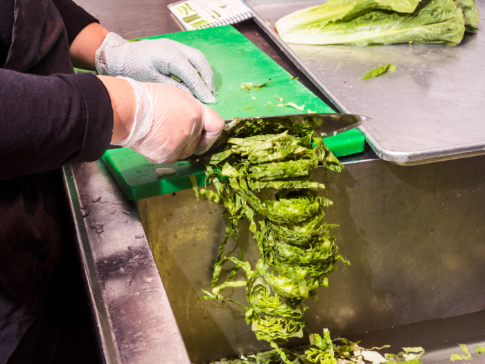 The cut lettuce gets pushed back into the sink with Victory wash ...