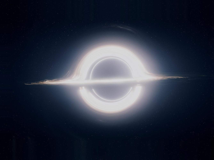 If humans ever saw a supermassive black hole up-close, it might look like this one from the sci-fi movie "Interstellar." However, the nearest one — called Sagittarius A* (pronounced "A-star") — is located 26,000 light-years away at the center of our Milky Way galaxy.