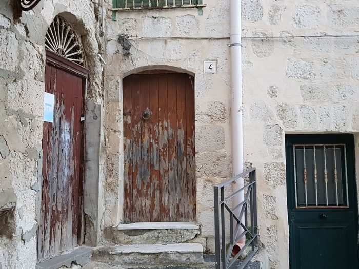 Intricate fixtures on the doors and balconies give the homes an old-world charm.