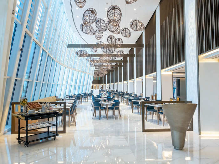 The dining room and other spaces on the main floor of the Jumeirah Beach Hotel are tastefully decorated in keeping with the ocean theme, though it doesn