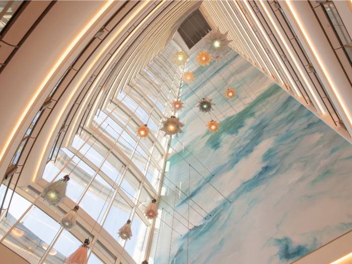 When I entered the Jumeirah Beach Hotel, I noticed the newly renovated lobby atrium, designed to let in lots of light and show off walls painted to evoke the sea. It