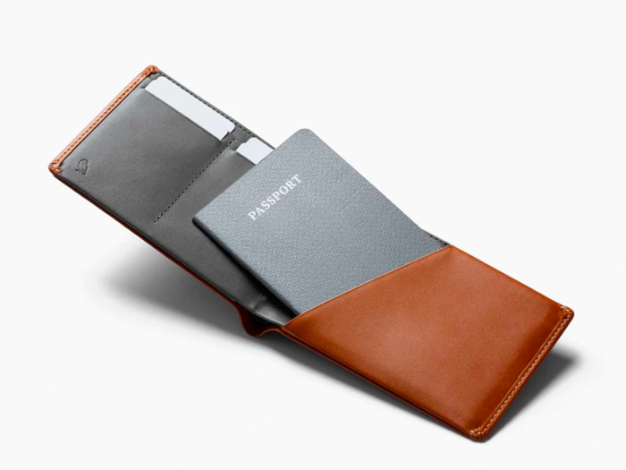 A travel wallet that also holds their passport